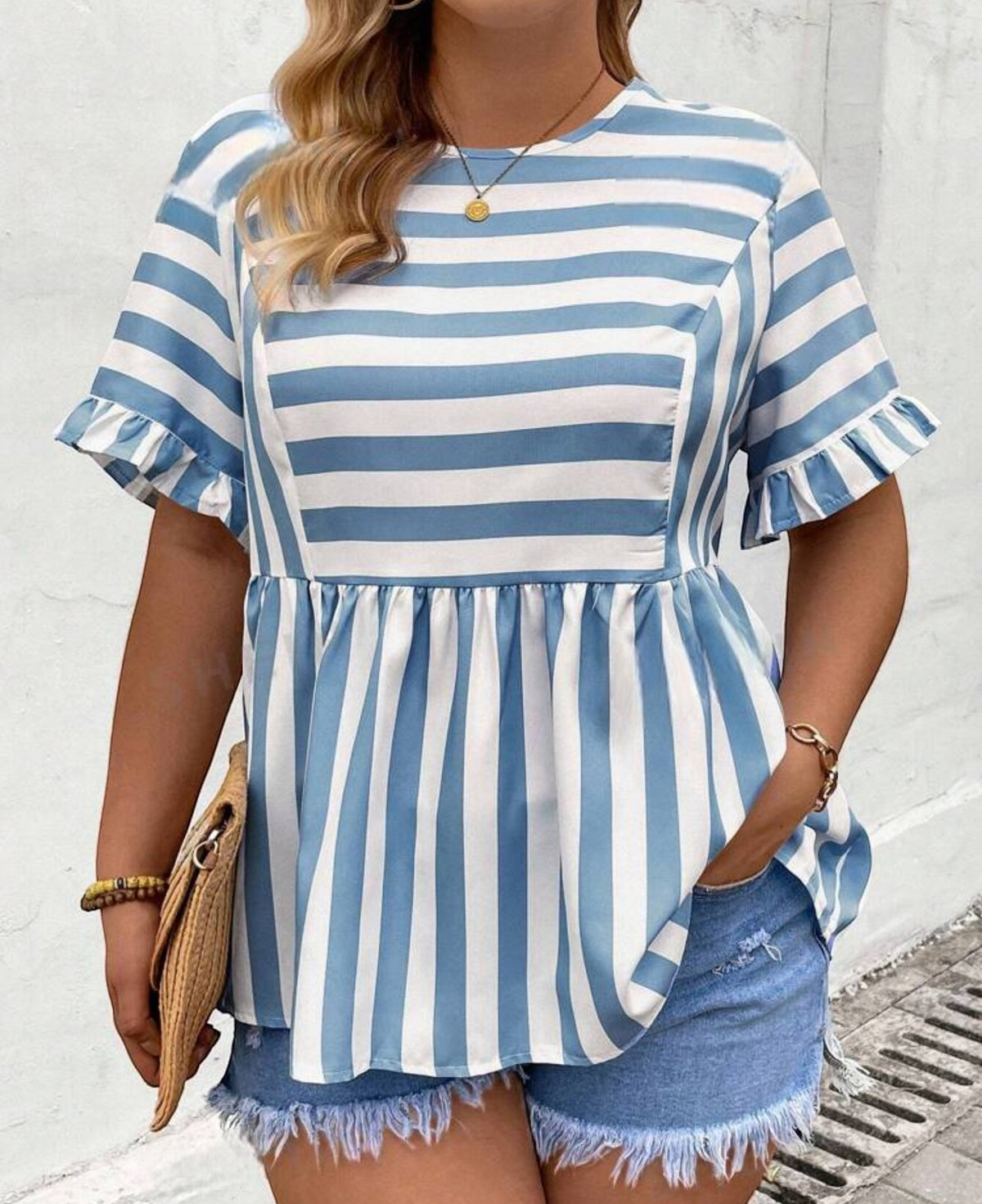 Blusa peplum de rayas bebe