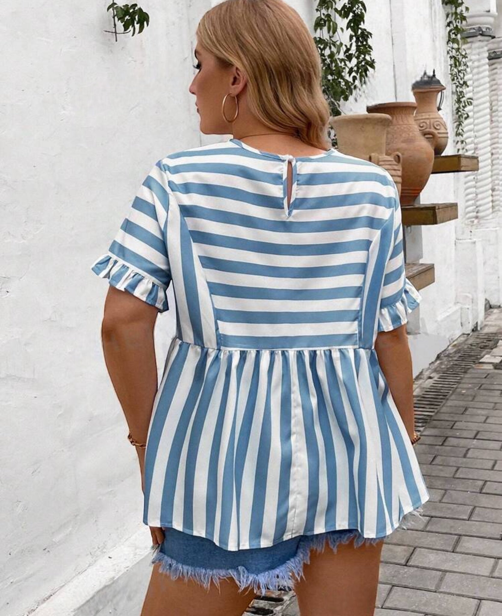 Blusa peplum de rayas bebe