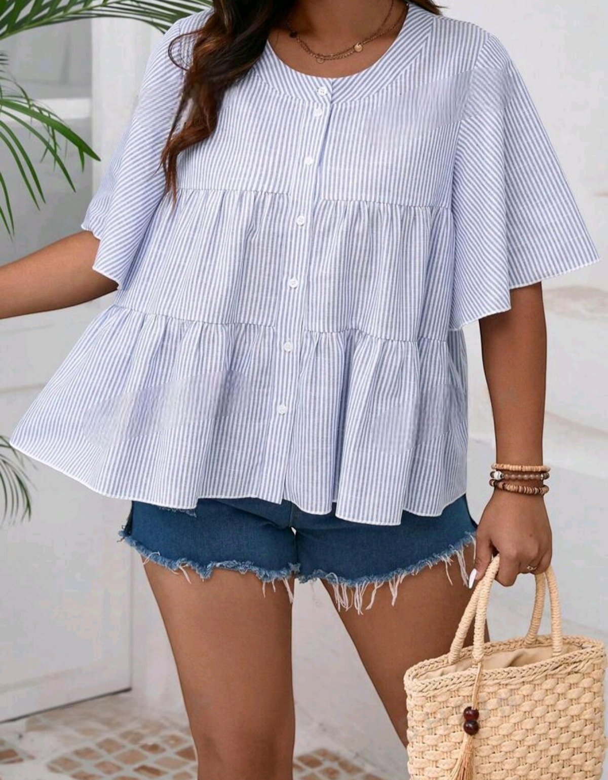Blusa peplum de rayas