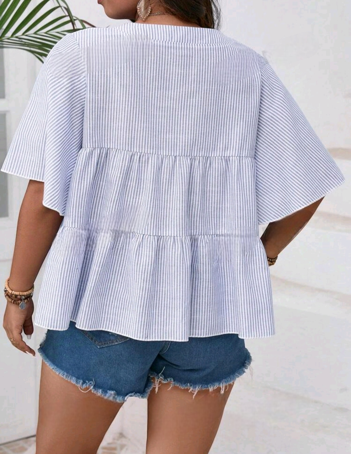 Blusa peplum de rayas