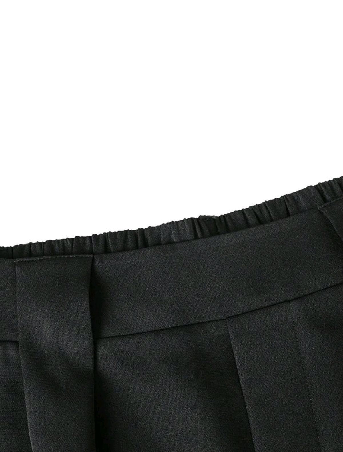 Short con pliegues negro